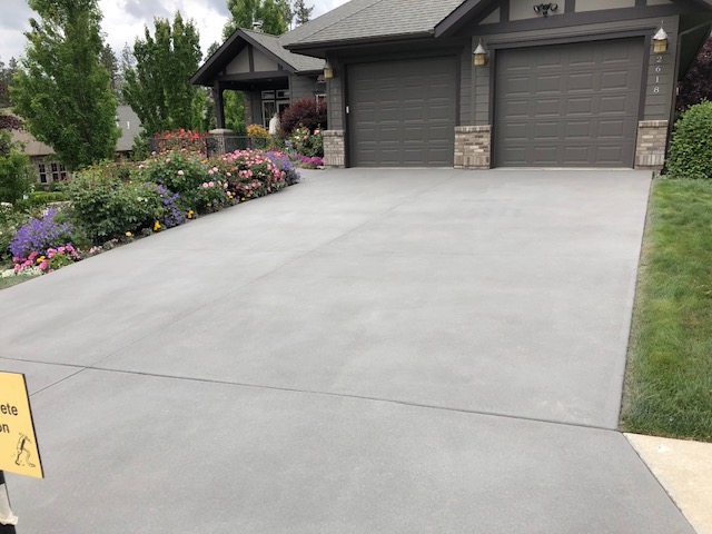 driveway and sidewalk after concrete services